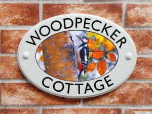 Woodpecker house plaque